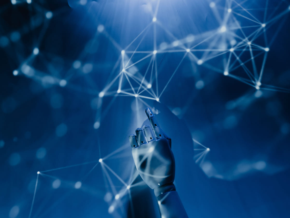 Robotic hand interacting with a connected digital network